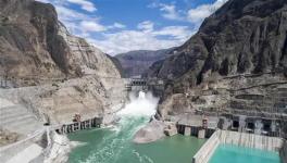 世界首座300米級低熱水泥混凝土特高拱壩全線貫通！