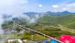總長13.5公里！空中水泥熟料運輸長廊試運行！